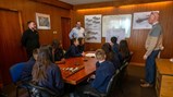 Callerton Academy students signing an exposed steel